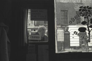 Looking out from an exhibition at the Tolmers Village Association shop, 1974.