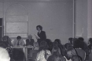 Patrick Allen addresses a public meeting, 1975