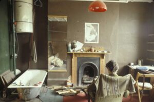 Bath in the living room at 19-25 Tolmers Square, 1975