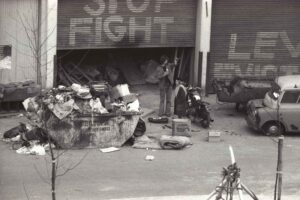 Passing the time of day, Tolmers Square, 1976