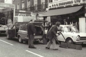 Loading from Simmonds second hand furniture, 180 North Gower Street, 1976
