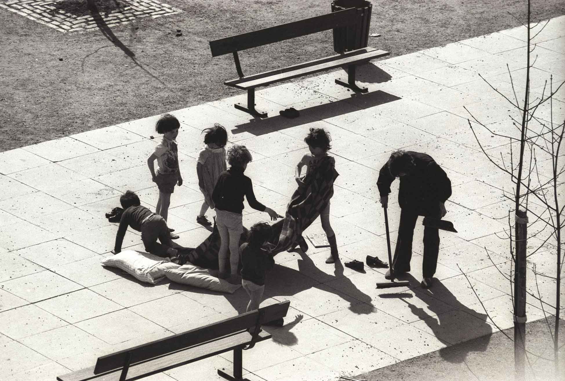 Playing in the centre of Tolmers Square, 1976