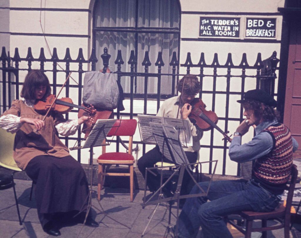 Chamber music on the pavement in North Gower Street during carnival, 1974